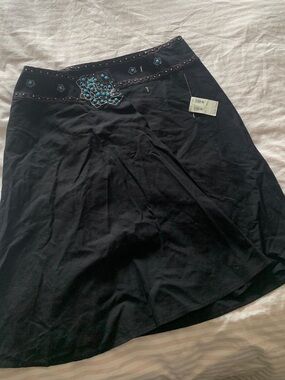 Harold's Black A-Line Skirt with Turquoise Embellishment